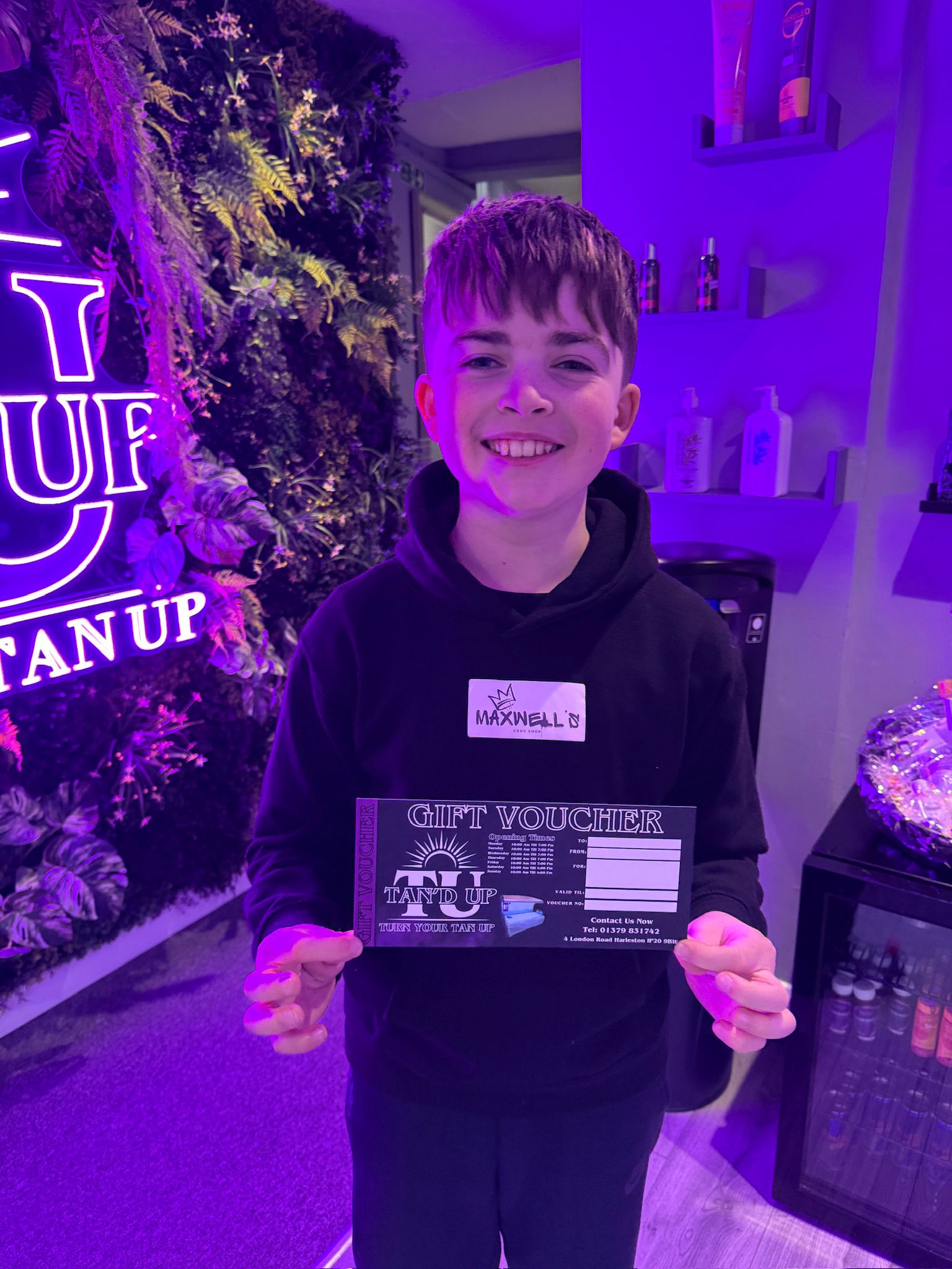 Kid holding a prize